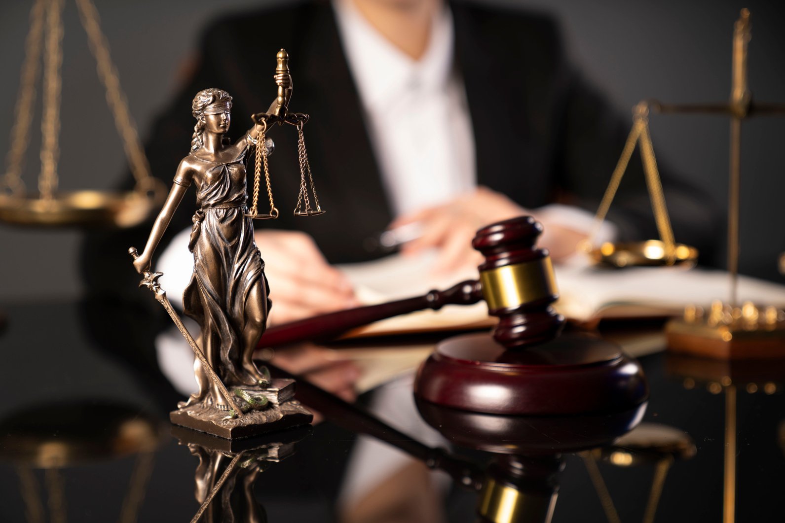 Female advocate in lawyer’s office.